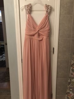 Dress size 12-14 worn it one, very pretty