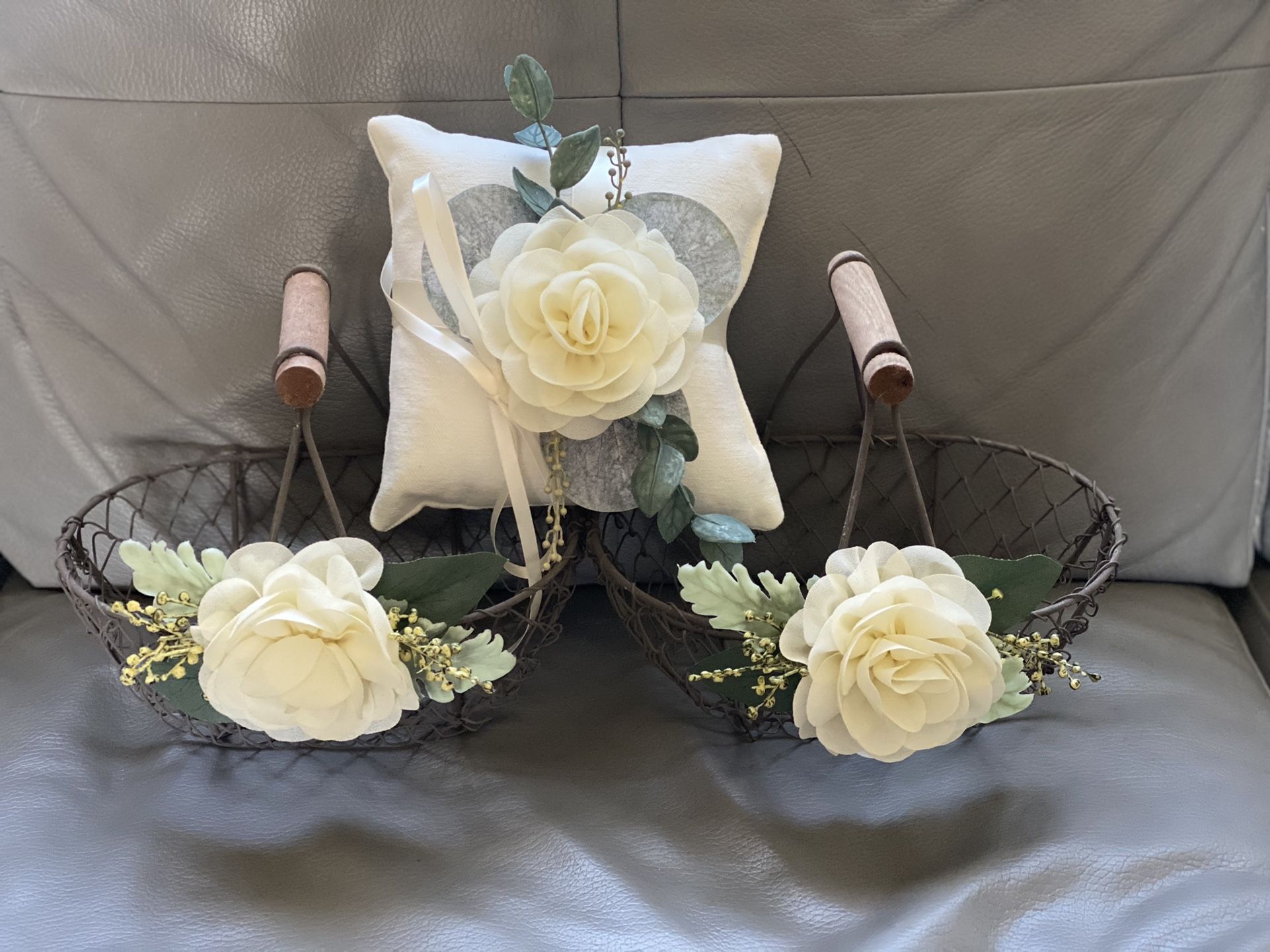 Flower Girls baskets and Ring Bearer Pillow.