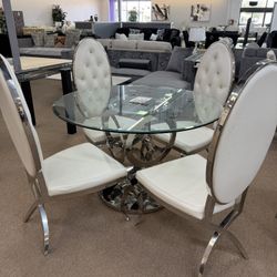 54” Tempted Glass table And 4 chairs 