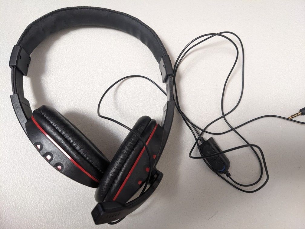 Black Wired headset Over-ear headphones with red accents & 3.5mm jack