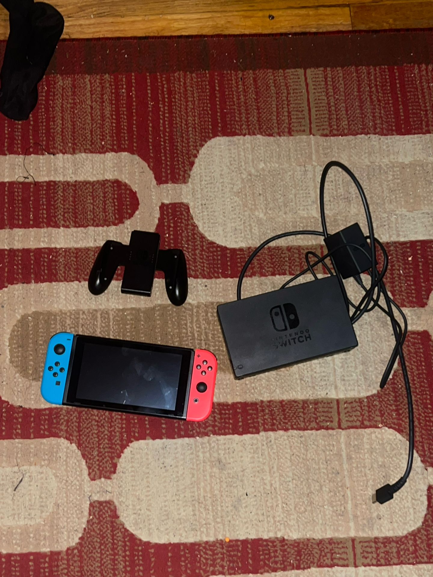 Nintendo Switch with Neon Blue and Neon Red Joy-Con