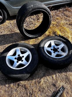 Two rims and tire