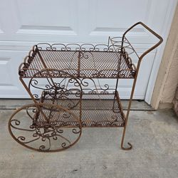 Antique rustic patio cart
