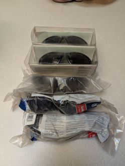 Five pair new safety glasses