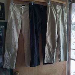 Place boys' khaki uniform pants in size 12.