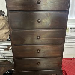 Tall, brown dresser
