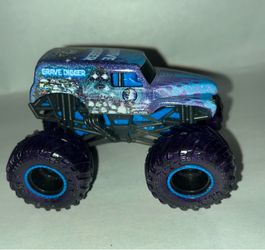 Monster Jam Grave Digger Galaxies Purple (Pre-Owned) Monster Truck 1:64 Die-Cast