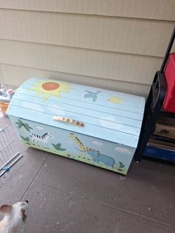 34x20x20  solid Wood  eith 3d carving and had paint  toy chest