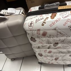 Mix Of Hard Shell Suitcases 