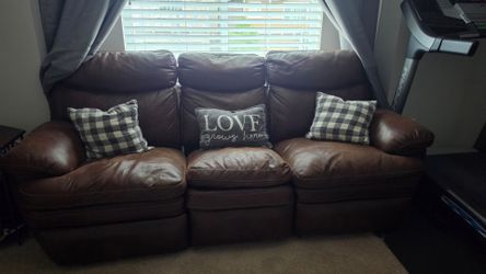 Brown faux leather reclining sofa