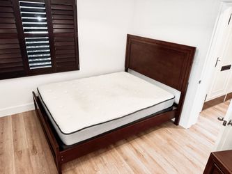 Beautiful solid wood queen-size bed.
