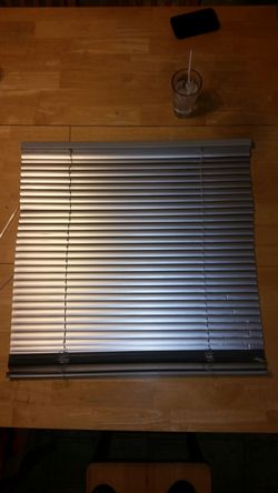 Custom made aluminum mini blinds.