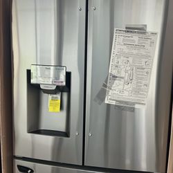 NEW IN BOX LG FRENCH STYLE REFRIGERATOR STAINLESS STEEL