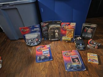 Dale Earnhardt Nascar's collection set 5 medium size car's that still in the packages one figurine one die-cast metal car has no box playing cards tha
