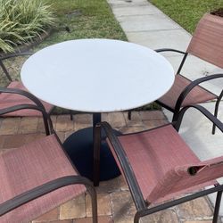 Patio Or Pool  table with 4 chairs 