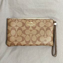 Brand new Coach wristlet