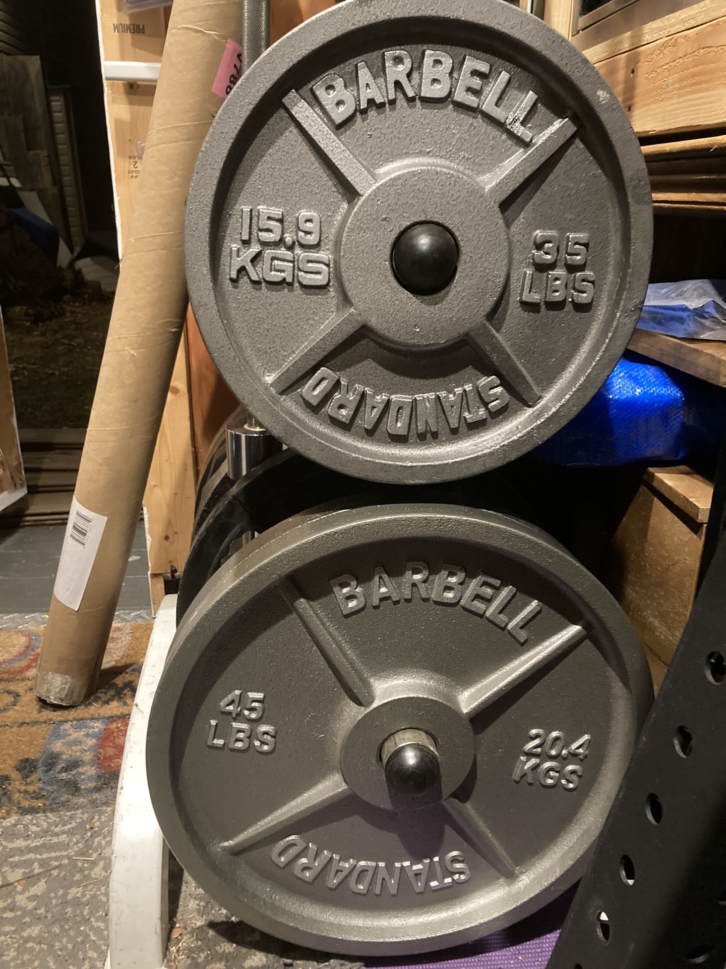 Excellent Condition Standard Barbell Pairs Of 45 Lb And 35 Lb Olympic Weight Plates