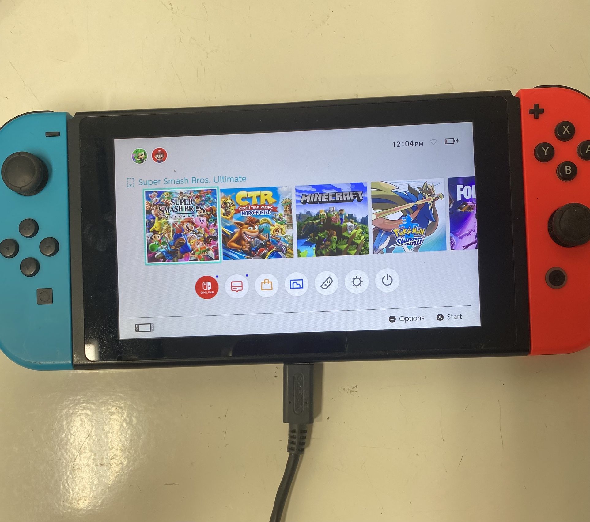 Nintnedo Switch. In Decent Condition And Work Like Normal. It Comes Without Games Chips. Only Pick Up And I’m Down To Negotiate On The Price