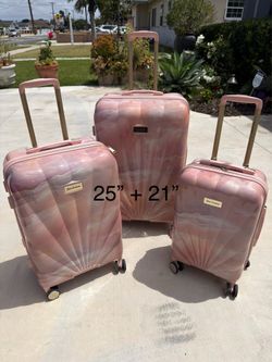 Brand new 25” and 21” juicy couture luggage