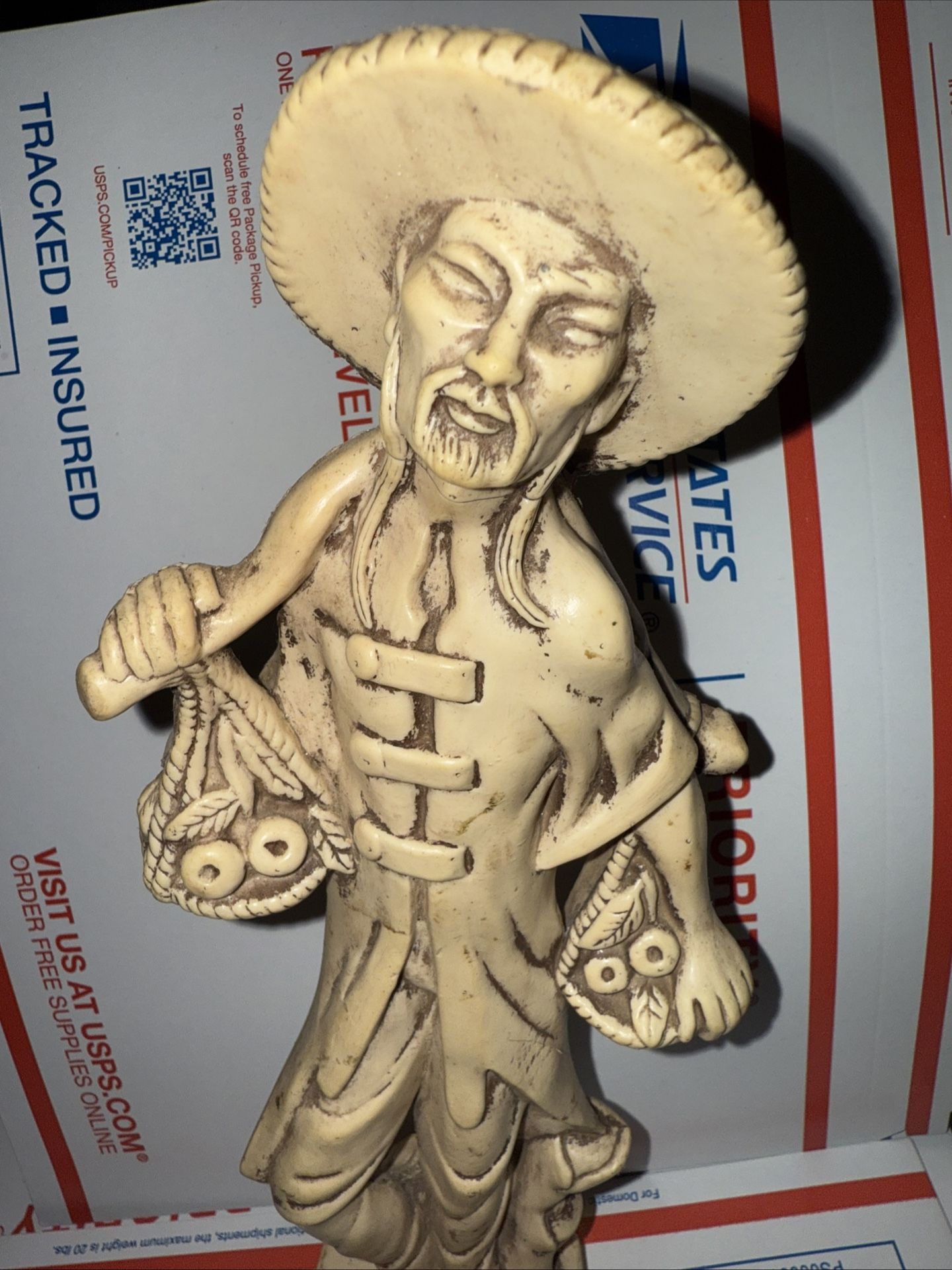 11" vintage Hard resin figurine of Chinese man carrying fruit 1962