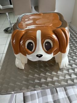 Clean baby potty in good condition, shaped like a dog