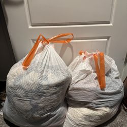 2 bags of gently used clothes L/XL $150 OBO