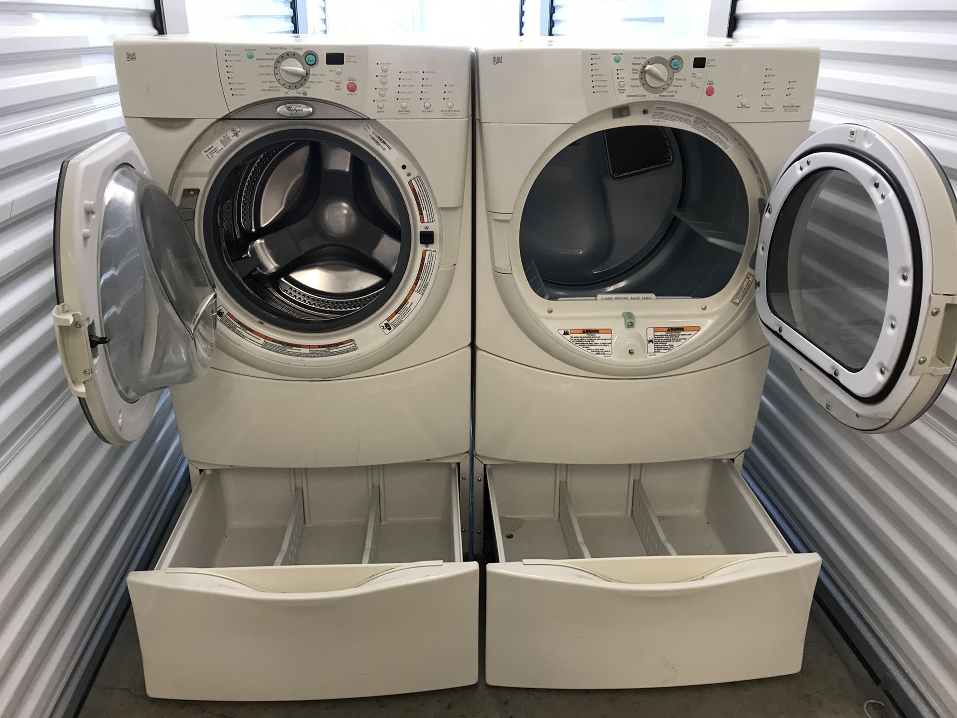 WHIRLPOOL DUET FRONT LOAD WASHER AND DRYER SET WITH PEDESTALS for Sale