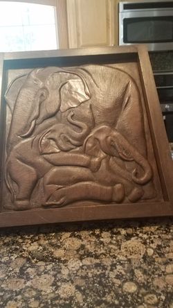 Framed hand Carved elephant art size 18X20 with hanger on back