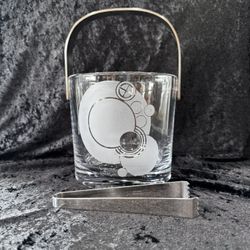 Vintage Frank Lloyd Wright Miller Rogaska Crystal Ice Bucket in the Japan Imperial Hotel Cabaret Style. Thick and heavy crystal ice bucket with a chro