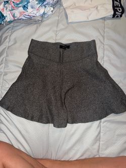 gray skirt by Talula features a structured, high-waisted fit size S