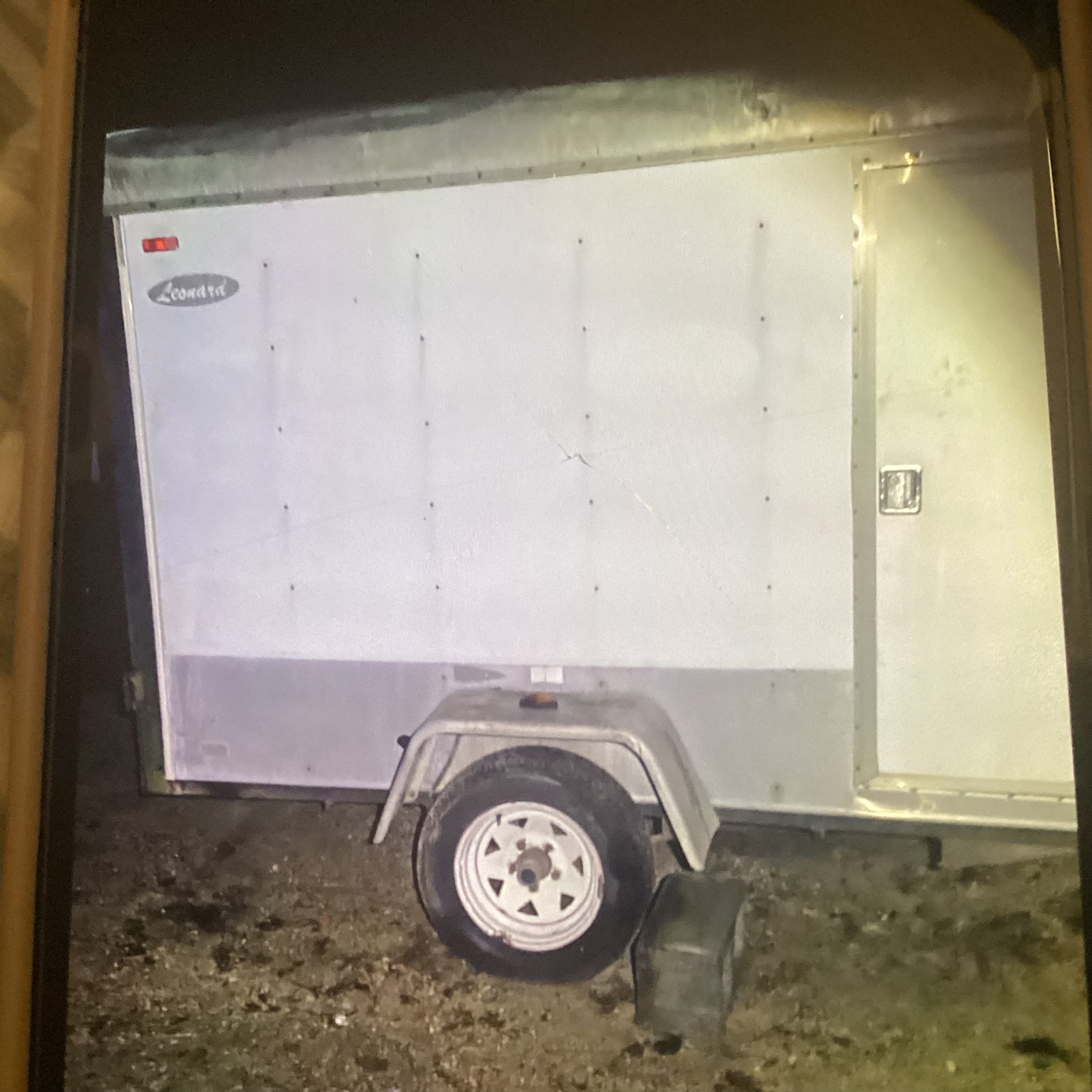 8x10 ENCLOSED LEONARD CARGO TRAILER WITH SIDE DOOR..