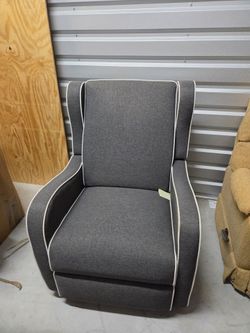 Dark gray recliner,  swivels and rocks