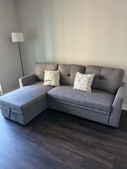 2-in-1 Upholstered L-Shaped Couch Bed (location: River North)
