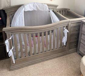 Baby crib with changing table attached