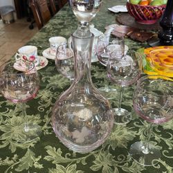 This is a vintage Toscany hand-blown glass decanter with an etched clipper ship design, made in Romania. 