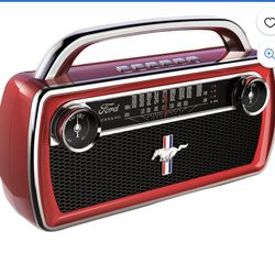 Retro looking boombox with classic '65 Mustang styling Responsive analog AM/FM tuner with speedometer look Powerful sound system with 3" stereo speake