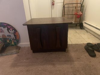 Free blanket storage side table