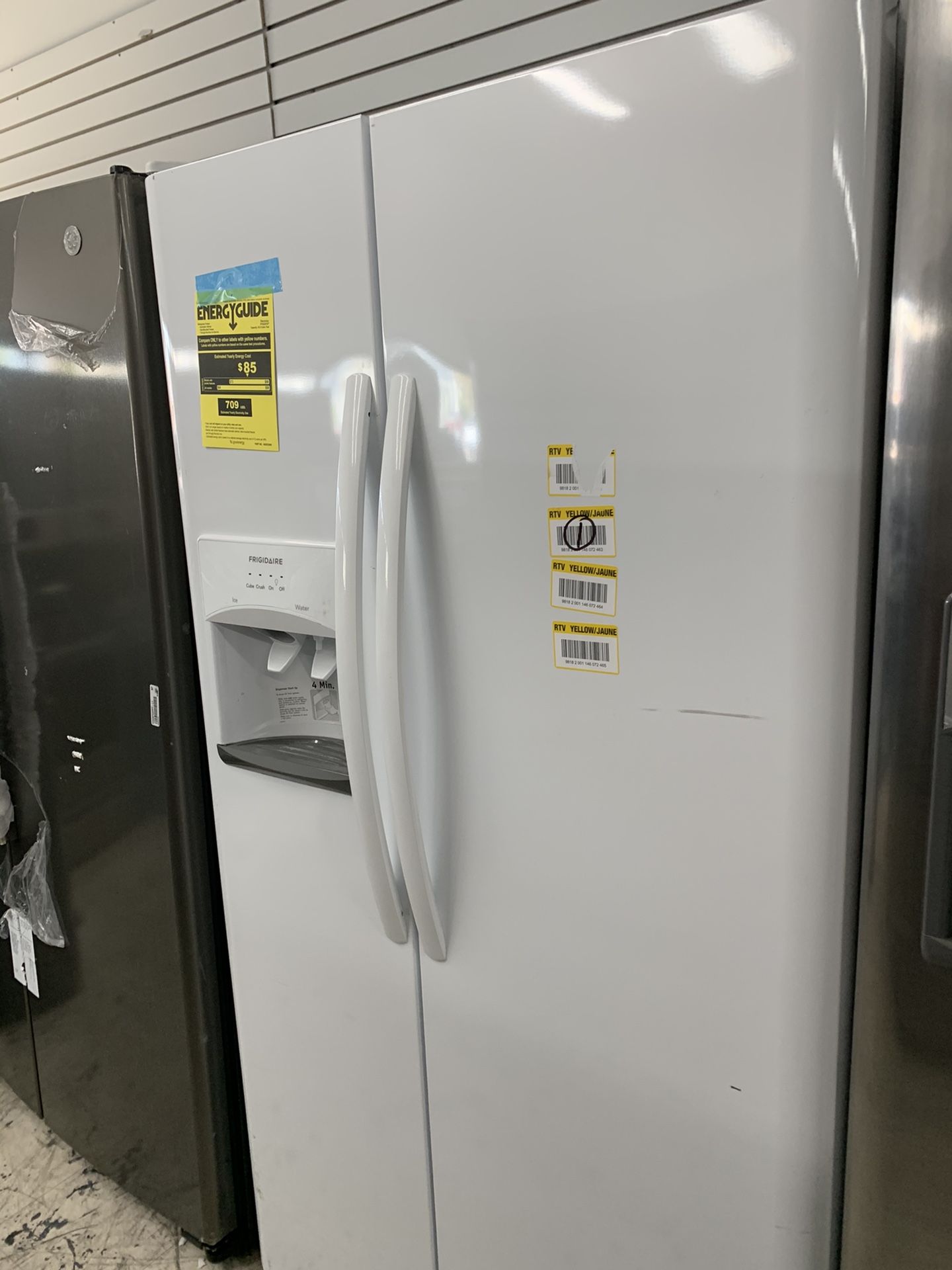 Frigidaire side by side in glossy white