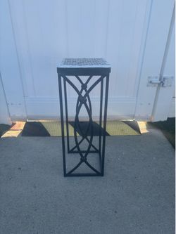 Metal planter with tile design