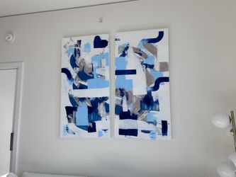 A Set Of Blue Painting Canvases