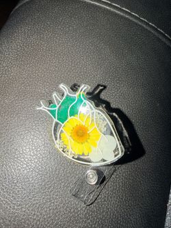 Sunflower heart badge reel