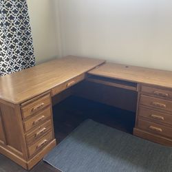 L-Shaped oak-colored desk