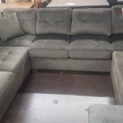 Chocolate brown sectional with ottoman