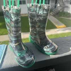 Dinosaur rain boots