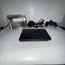 Ps2 slim console with games cords and controller