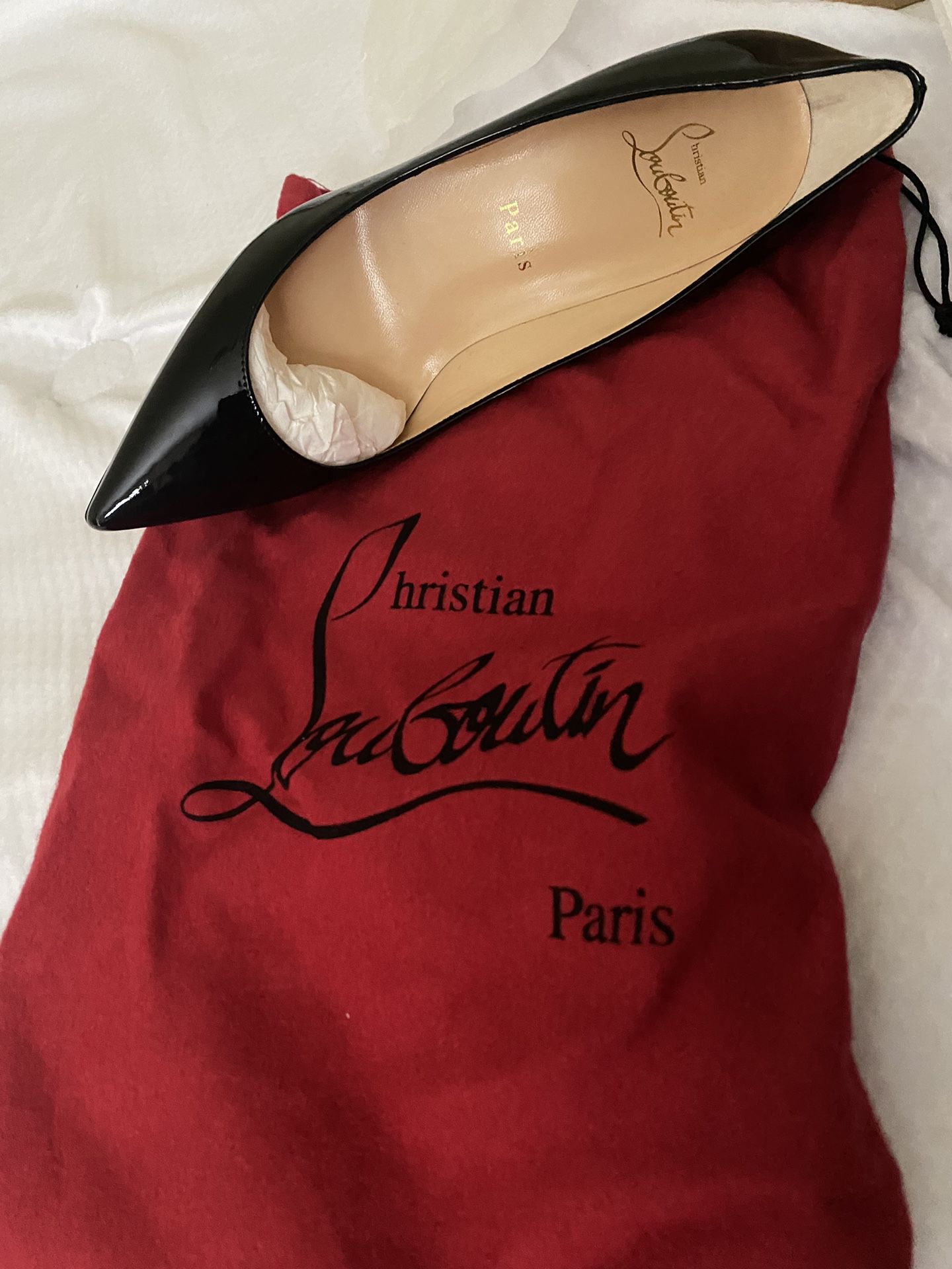 Christian Louboutin, Red Bottoms