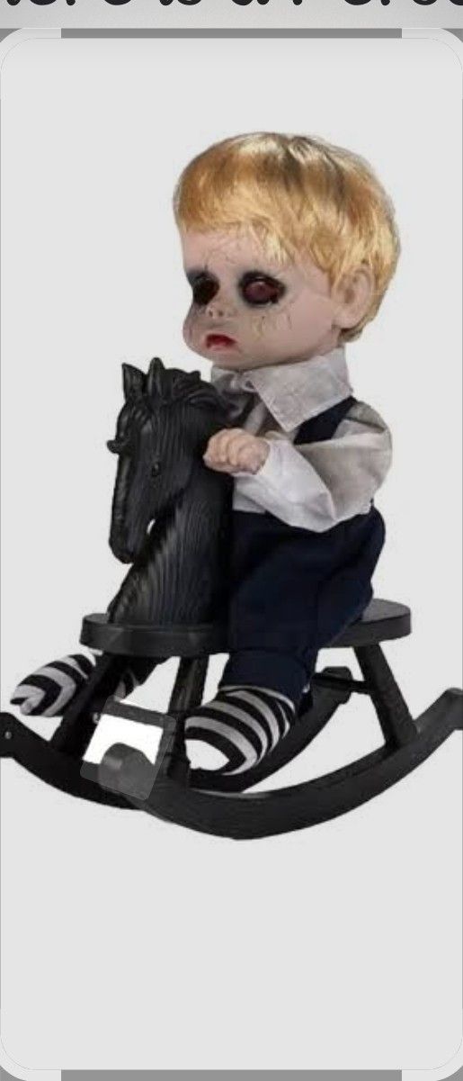 Creepy Babydoll Talks, Sings. LED