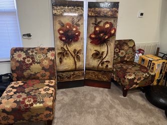 Two Chairs And Two Pictures
