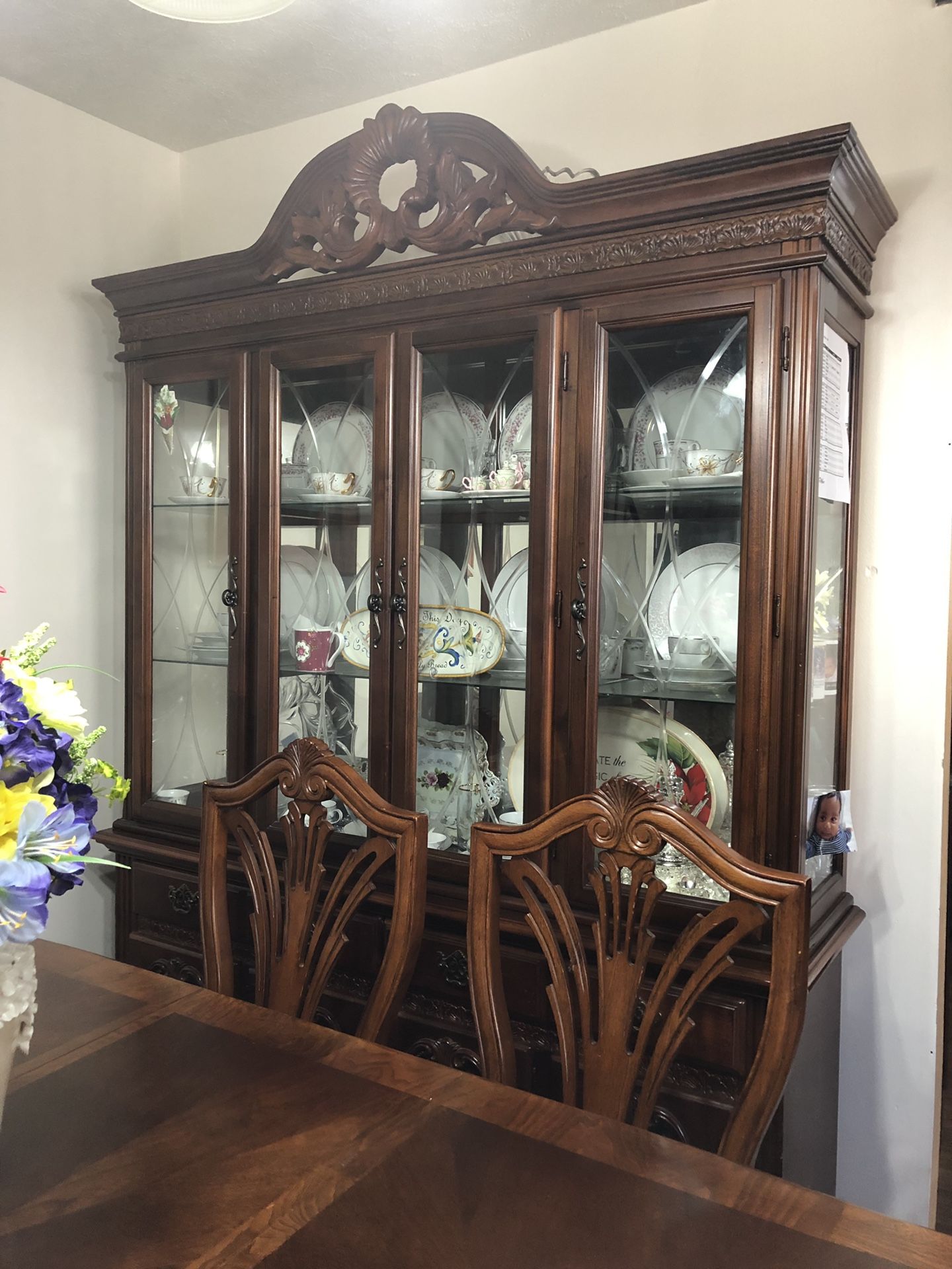 Dining room set with China and living show case