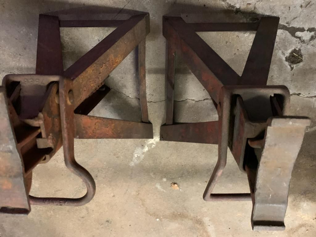 Two vintage heavy duty jack stands. 15 inches tall at lowest setting. One is a Blackhawk one Manley. Both the same height. Not sure of weight capacity